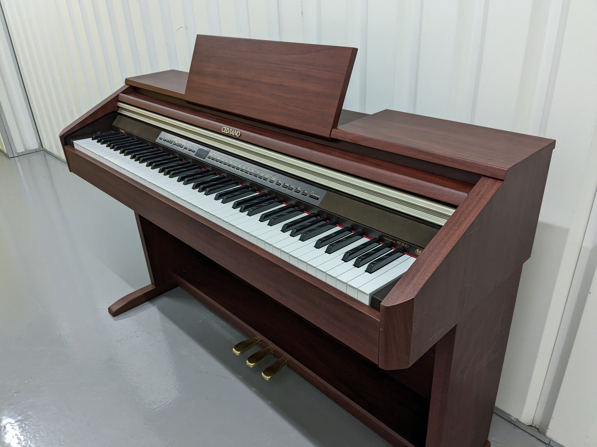 Casio Celviano AP-500 digital piano in mahogany colour stock number 23 –  Sulinda Music