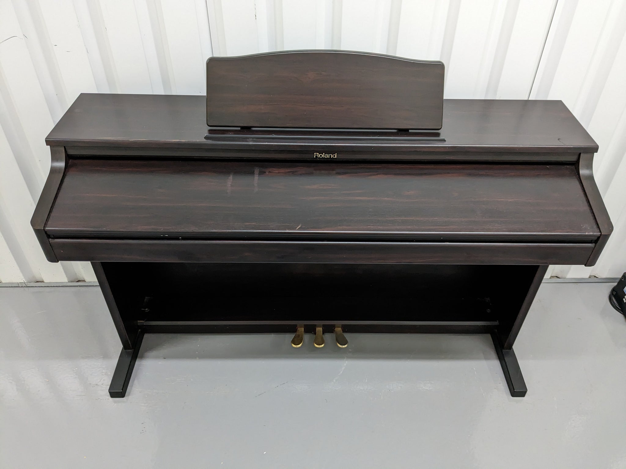 Roland HP-2E Digital Piano in dark rosewood Stock nr 23068 
