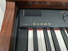 Load image into Gallery viewer, Yamaha Clavinova CVP-103 Digital Piano and stool in mahogany stock nr 23094
