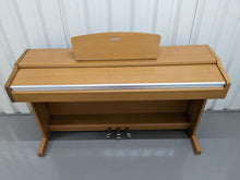 Load image into Gallery viewer, Yamaha Arius YDP-131 Digital Piano in cherry / light oak  finish stock nr 23096
