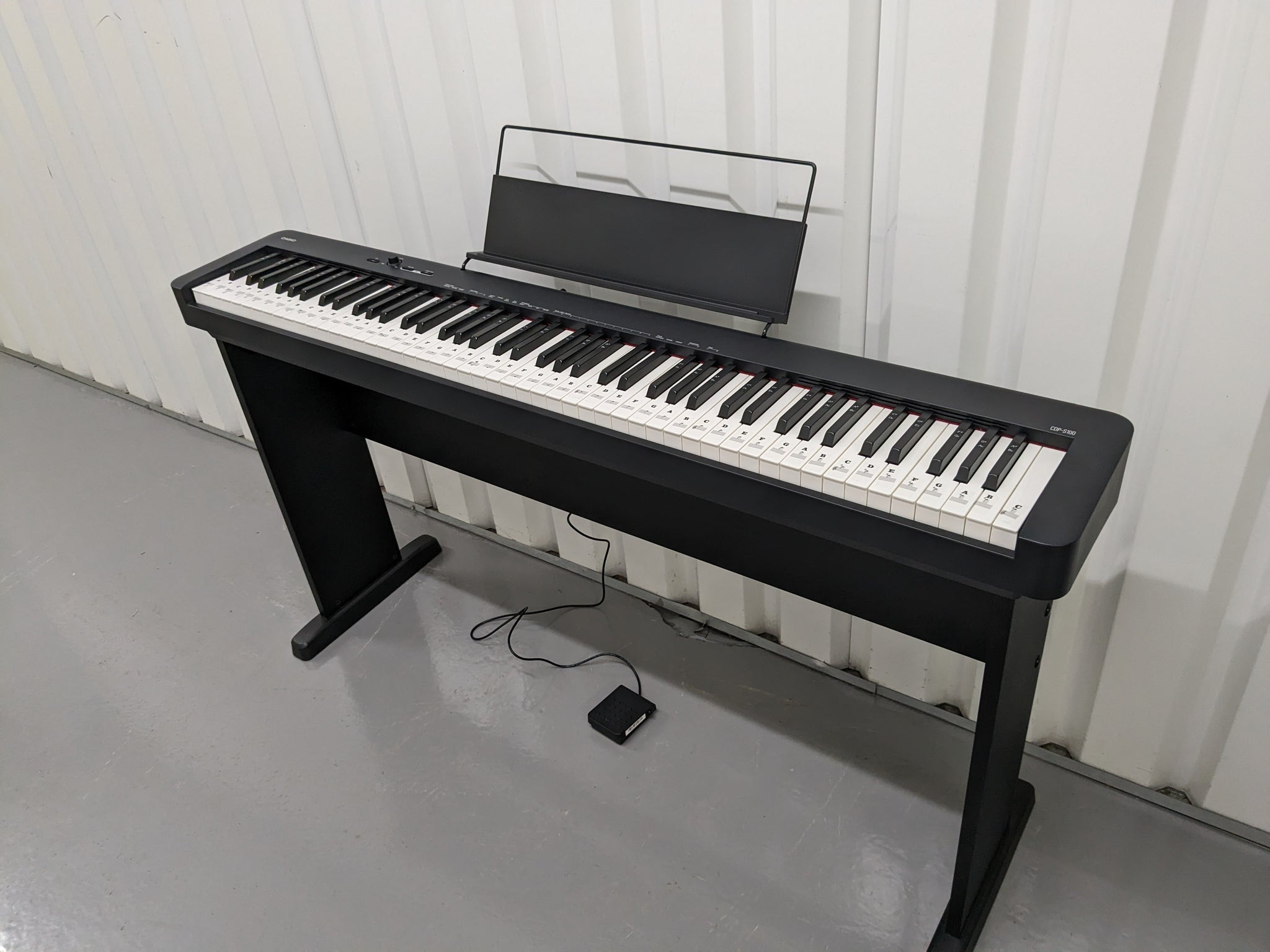 Casio CDP-S100 digital piano keyboard and stand in black stock