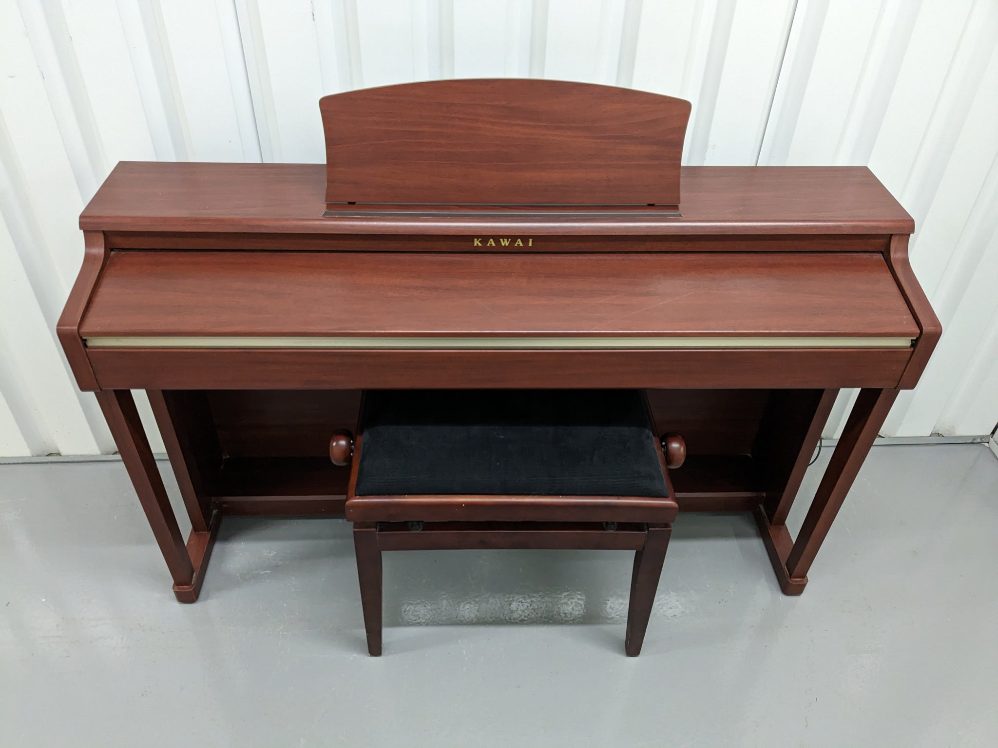 Kawai digital piano CN24 and stool In Mahogany Finish stock number 231 –  Sulinda Music