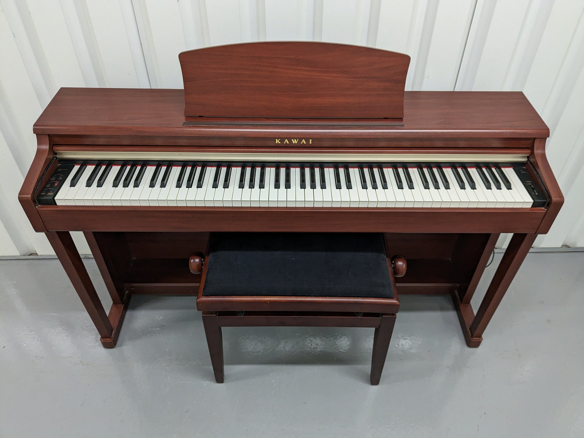 Kawai digital piano CN24 and stool In Mahogany Finish stock number 231 –  Sulinda Music