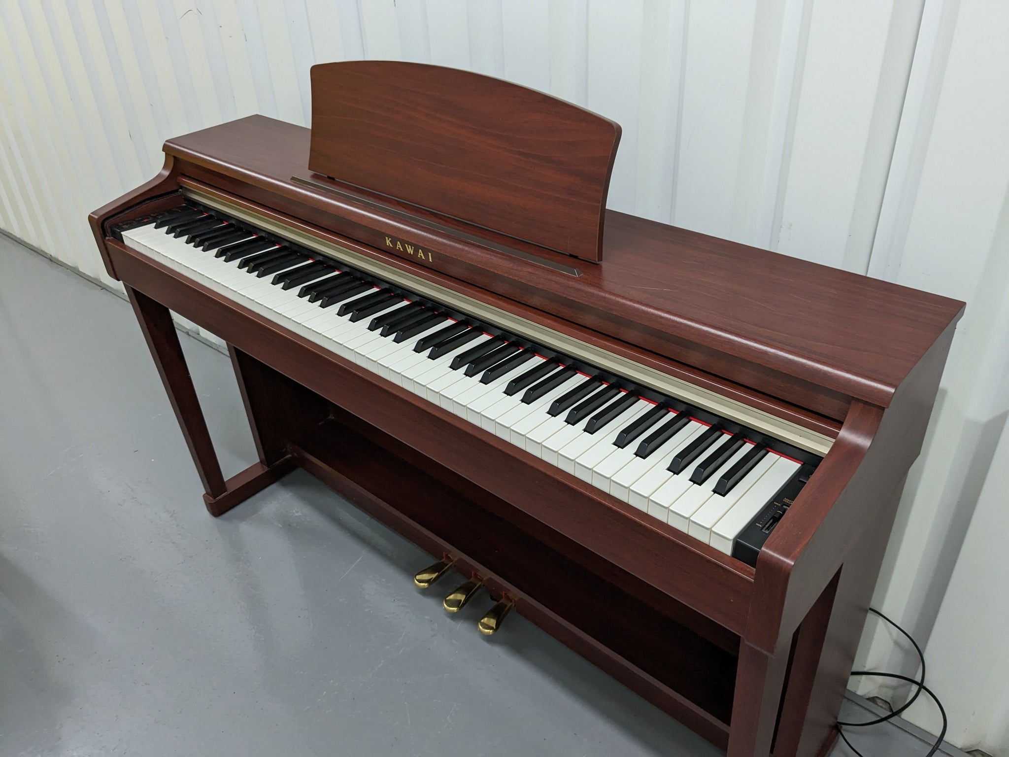 Kawai digital piano CN24 and stool In Mahogany Finish stock number 231 –  Sulinda Music