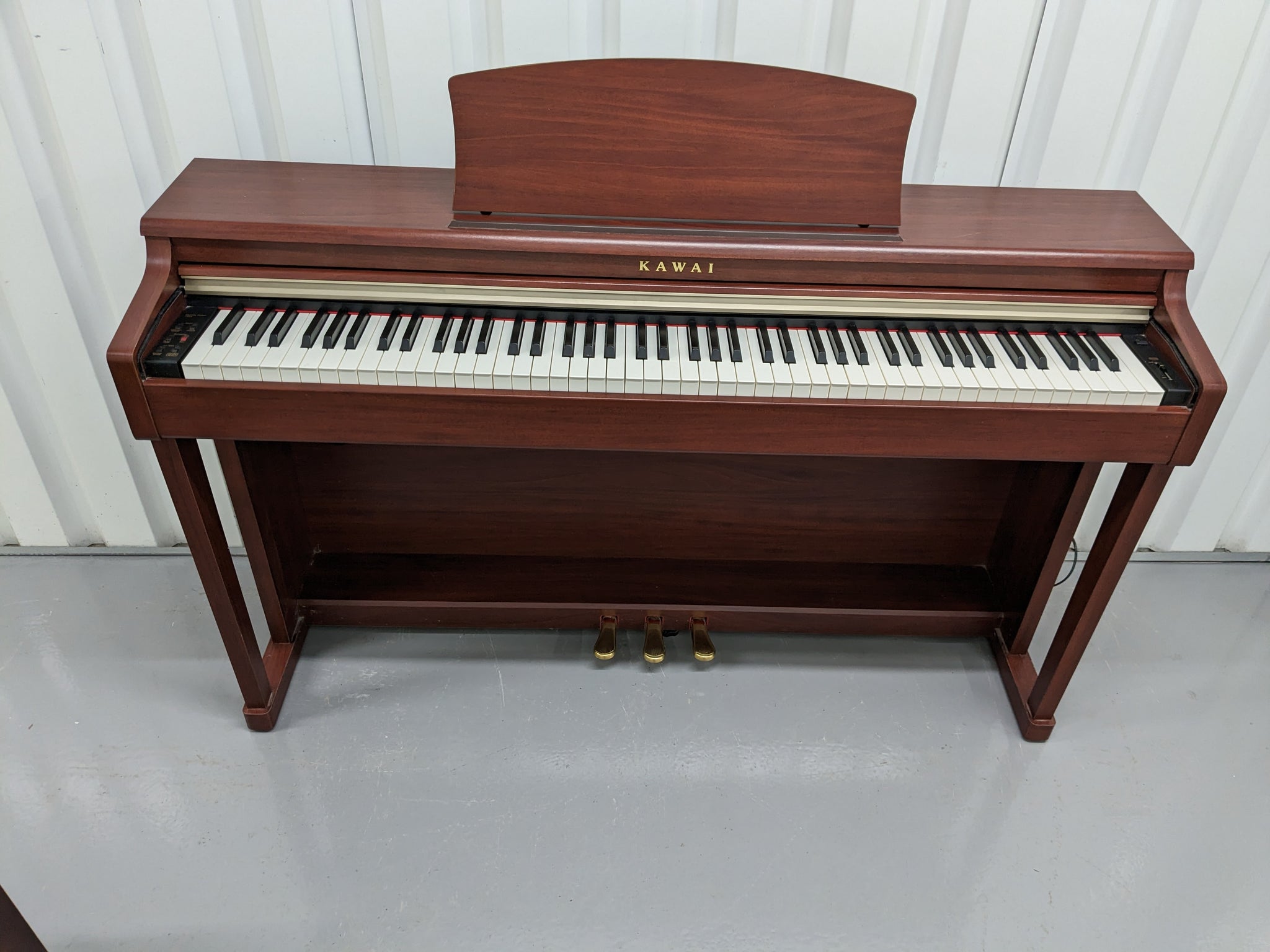 Kawai digital piano CN24 and stool In Mahogany Finish stock number 231 –  Sulinda Music