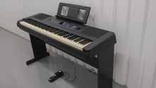 Load and play video in Gallery viewer, Yamaha DGX-650 black  / rosewood portable grand piano keyboard and stand stock #23088
